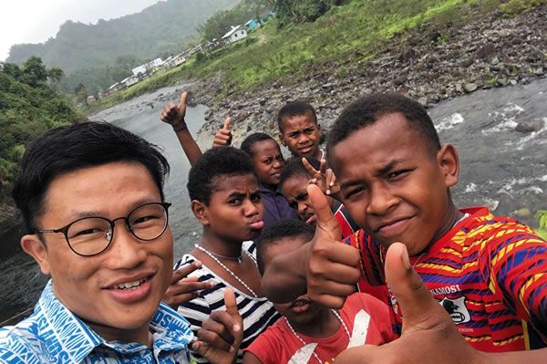 Seminarian Kyawa Zaw (left, wearing glasses) with village youth